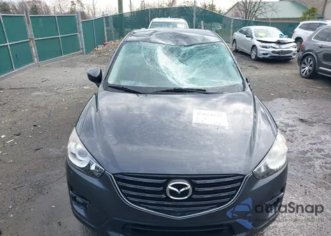 2016 Mazda Cx-5 Touring from USA, damaged, VIN JM3KE4CY7G0713305